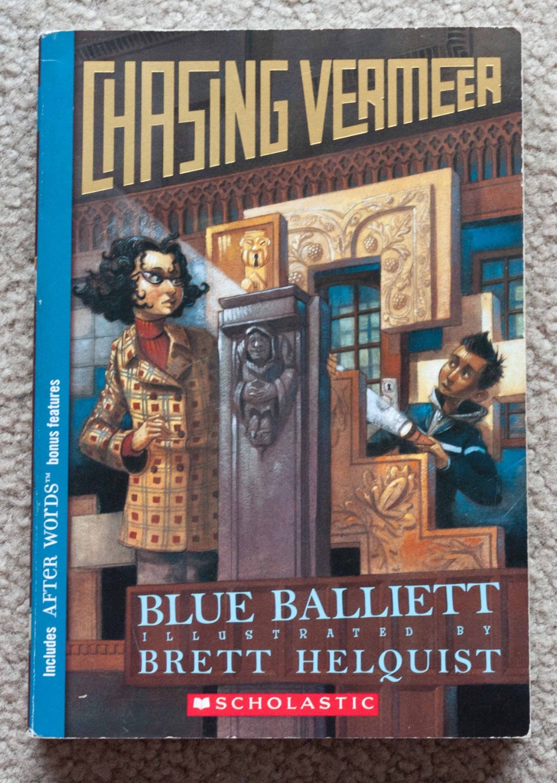Chasing Vermeer by Blue Balliett (Scholastic) – Paperback, 254 pages