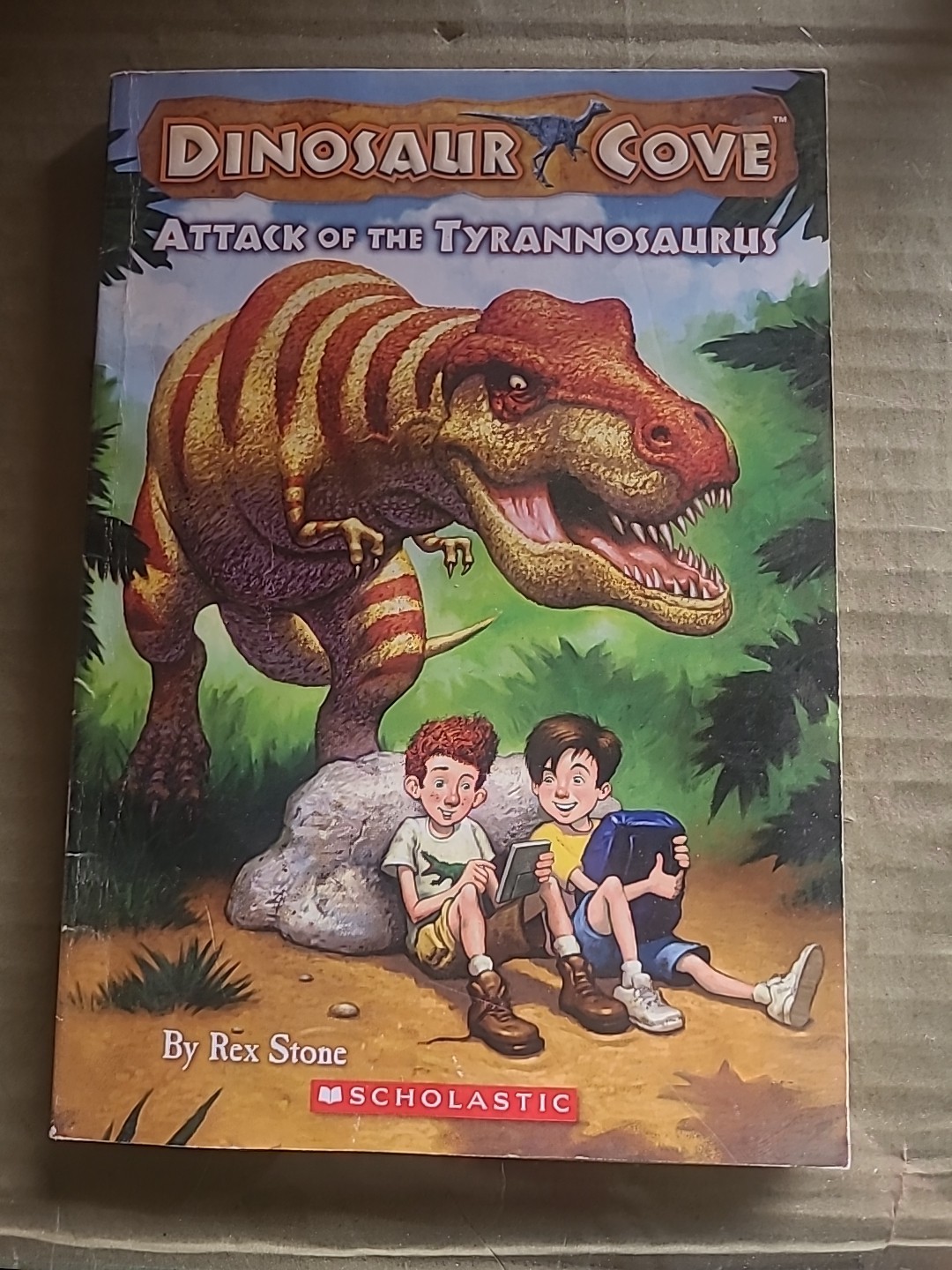 Attack of the Tyrannosaurus (Dinosaur Cove, No. 1) – Paperback – GOOD