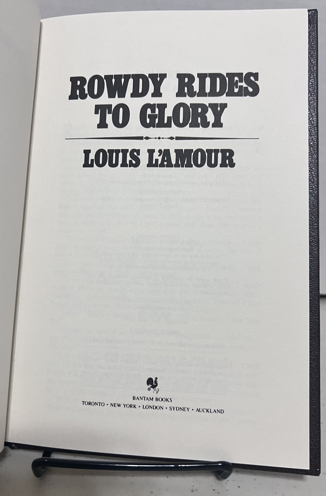 ROWDY RIDES TO GLORY Louis L’Amour Collection Leatherette – LIKE NEW, 1st Print