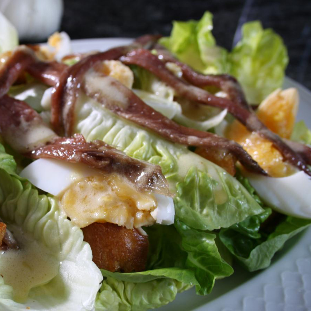 El Capricho Anchovy, Egg, Crouton & Crisp Lettuce Salad with a Creamy Vinaigrette