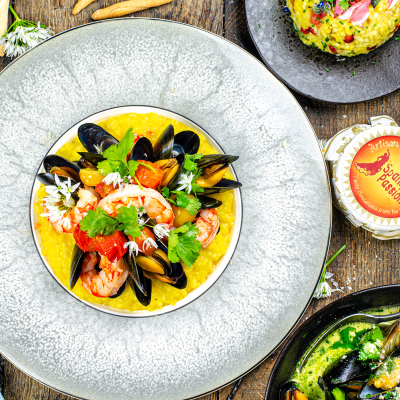 Saffron Risotto with Argentinian Red Prawns, Mussels and Cherry Tomatoes.