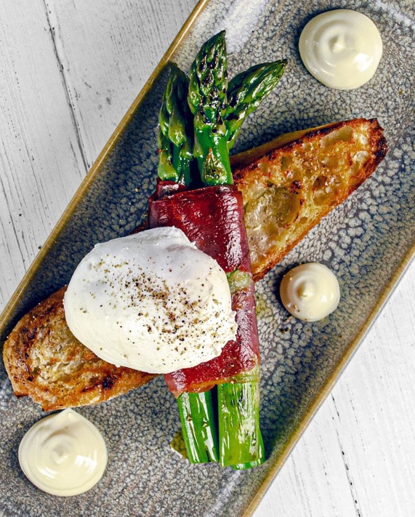 Asparagus, Serrano Ham, Soft Poached Egg. Olive oil croute, Allioli Mayonnaise