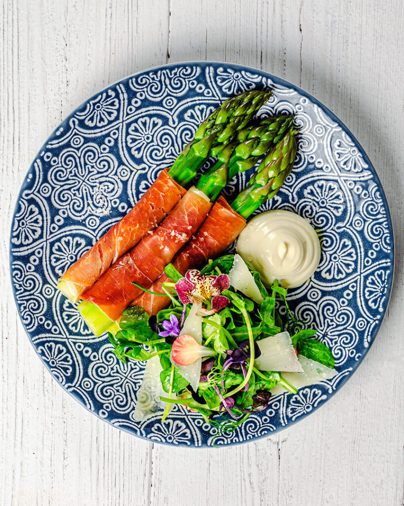 Serrano wrapped English Asparagus,Aioli Mayonnaise, Pea shoot and Watercress salad.