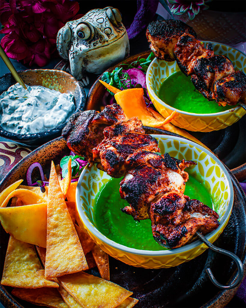 Peruvian Chicken Anticuchos,Green Mojo Sauce,Corn Tortilla Crisps.